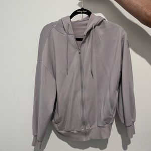 Gently used lavender Alo zip up size XS
